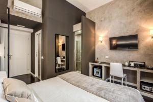 Postel nebo postele na pokoji v ubytování Four Rivers Suites