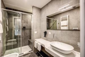 Koupelna v ubytování Four Rivers Suites