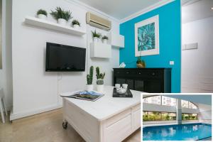 TV a/nebo společenská místnost v ubytování NEW VIP piscina y gimnasio