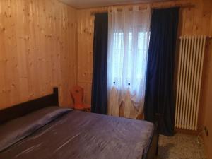 Postel nebo postele na pokoji v ubytování Il Dehors