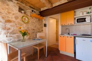 Η κουζίνα ή μικρή κουζίνα στο Agriturismo Fattoria Ortoalpino