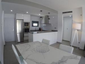 Kuchyňa alebo kuchynka v ubytovaní Lamar Resort Penthouse