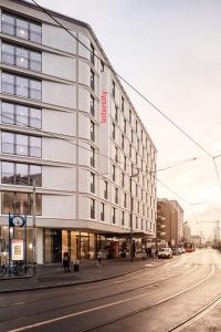 a rendering of a building on a city street at IntercityHotel Frankfurt Hauptbahnhof Süd in Frankfurt/Main