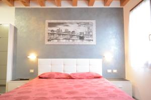 Postel nebo postele na pokoji v ubytování B&B Casa Taty