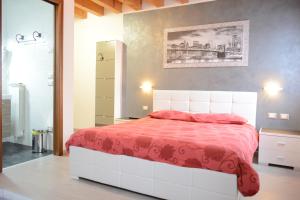 Postel nebo postele na pokoji v ubytování B&B Casa Taty
