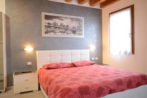 Postel nebo postele na pokoji v ubytování B&B Casa Taty