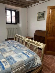 A bed or beds in a room at San Martino Vald'Afra