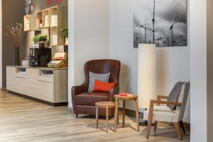 Uma área de estar em IntercityHotel Frankfurt Hauptbahnhof Süd