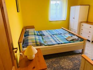Postel nebo postele na pokoji v ubytování Penzion Rozalie