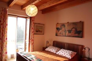 Postel nebo postele na pokoji v ubytování Bed & Breakfast Lucy