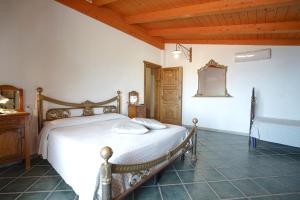 Postel nebo postele na pokoji v ubytování Hotel Residence Costa Azzurra