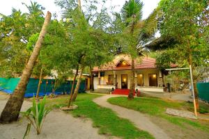 Gallery image of Marari Lotus Beach Villa in Mararikulam