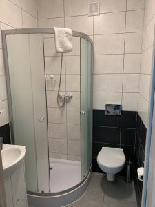 Kúpeľňa v ubytovaní Noclegi Mazurow DARMOWY PARKING