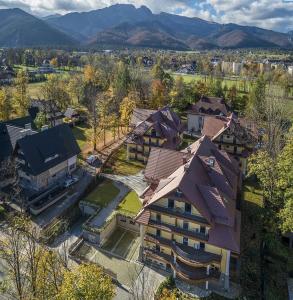 an overhead view of a house with mountains in the background at Stella Di Mare in Zakopane