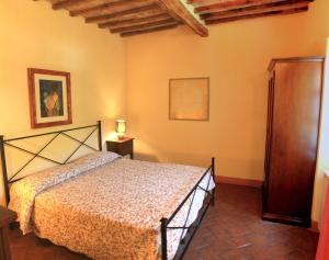 A bed or beds in a room at Il Giardino Segreto
