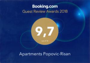 a sign that reads guest review awards applicants ppps russian at Apartments Popovic-Risan in Risan