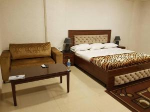 Tahir Guest Palace客房内的一张或多张床位