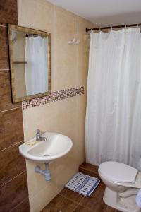 Een badkamer bij Cabañas Green Yard