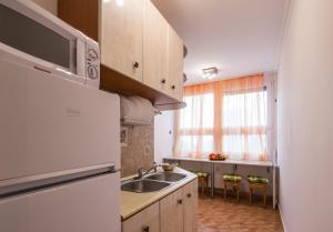 Kuchyňa alebo kuchynka v ubytovaní Central Home- Pesterzsébet