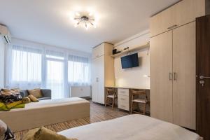 Posteľ alebo postele v izbe v ubytovaní Central Home- Pesterzsébet
