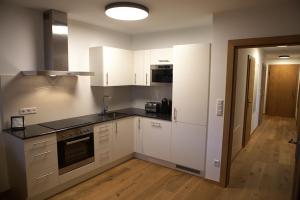 A kitchen or kitchenette at Kitzbuheler Alpen Residenz Top2 Hollersbach