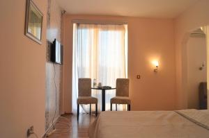 Postel nebo postele na pokoji v ubytování Hotel Park
