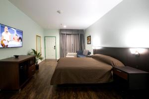 Posteľ alebo postele v izbe v ubytovaní Hotel Bel Air