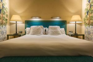 Posteľ alebo postele v izbe v ubytovaní Hotel Casa Del Poeta