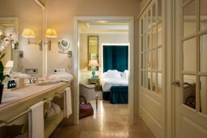 Posteľ alebo postele v izbe v ubytovaní Hotel Casa Del Poeta