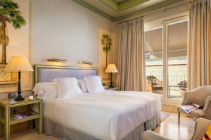 Posteľ alebo postele v izbe v ubytovaní Hotel Casa Del Poeta