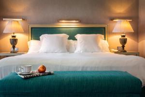 Posteľ alebo postele v izbe v ubytovaní Hotel Casa Del Poeta