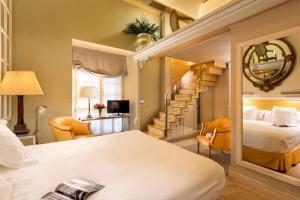 Posteľ alebo postele v izbe v ubytovaní Hotel Casa Del Poeta