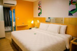 Postel nebo postele na pokoji v ubytování Go Hotels Iligan