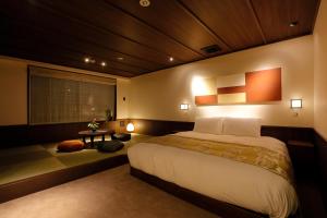 Cama o camas de una habitación en THE JUNEI HOTEL Kyoto Imperial Palace West