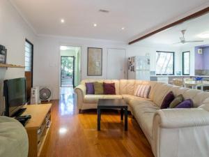 a living room with a couch and a table at Billa Blue in Point Lookout