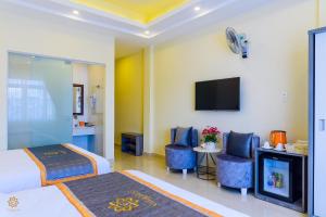 Voodi või voodid majutusasutuse VF Hotel Dalat toas