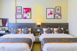 Voodi või voodid majutusasutuse VF Hotel Dalat toas