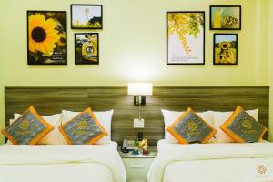 Voodi või voodid majutusasutuse VF Hotel Dalat toas