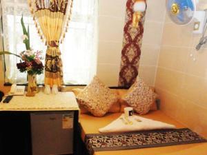 Predel za sedenje v nastanitvi First Inn Hotel & Guest House Reception at 10TH F, Block E