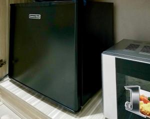 Kuchyň nebo kuchyňský kout v ubytování Super Cute Hampton Suites
