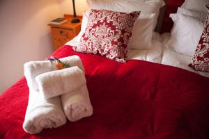 Voodi või voodid majutusasutuse Fisherman's Cottage toas