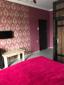 Letto o letti in una camera di Guest house BAGRATIONI