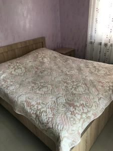 Letto o letti in una camera di Guest house BAGRATIONI