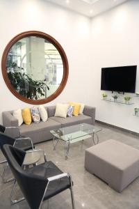 Sjónvarps- og/eða afþreyingartæki á Verdun Suites Hotel