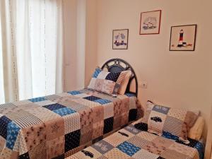 Posteľ alebo postele v izbe v ubytovaní EL EDEN de PLAYA DE GANDIA - Alquiler Familiar.