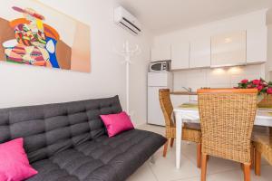 Kuchyň nebo kuchyňský kout v ubytování Apartments Kukuriku