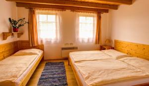 Postel nebo postele na pokoji v ubytování Holiday Village Tatralandia
