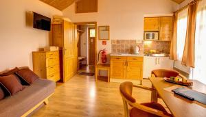Kuchyň nebo kuchyňský kout v ubytování Holiday Village Tatralandia