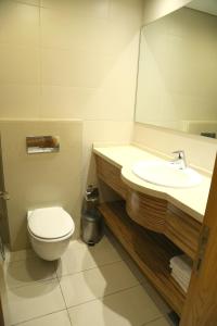 Baðherbergi á Verdun Suites Hotel