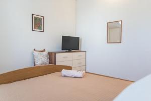 Postel nebo postele na pokoji v ubytování Apartments Petranic